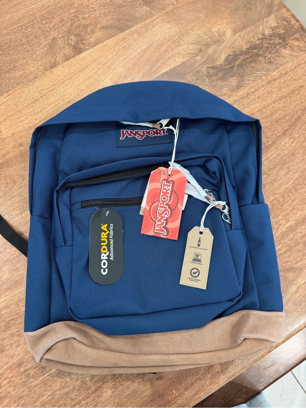 Jansport Navy Backpack with Tan Suede Base